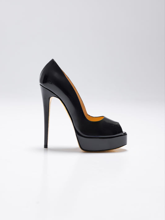 talon a plateforme en cuir noir et semelle or pour femme vu de profil