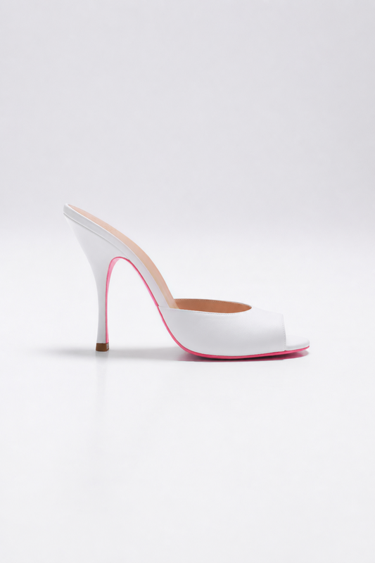mule a talon en cuir blanc et semelle rose pour femme vu de profil
