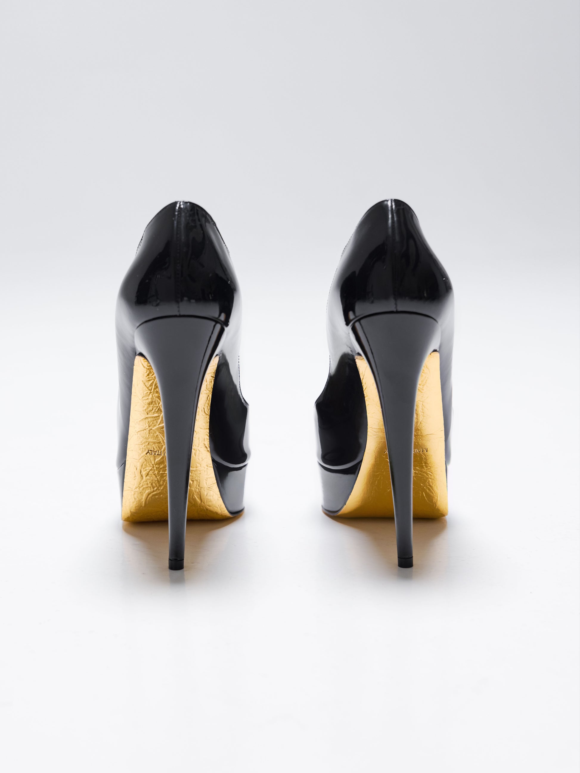 talon a plateforme en cuir noir et semelle or pour femme de dos